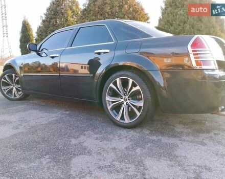 Черный Крайслер 300C, объемом двигателя 3.5 л и пробегом 202 тыс. км за 7593 $, фото 1 на Automoto.ua