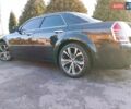 Черный Крайслер 300C, объемом двигателя 3.5 л и пробегом 202 тыс. км за 7593 $, фото 1 на Automoto.ua