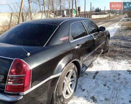 Черный Крайслер 300C, объемом двигателя 2.7 л и пробегом 183 тыс. км за 7500 $, фото 12 на Automoto.ua