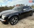 Черный Крайслер 300C, объемом двигателя 2.73 л и пробегом 234 тыс. км за 7500 $, фото 1 на Automoto.ua