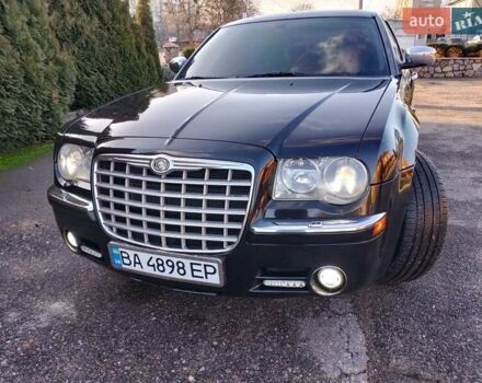 Черный Крайслер 300C, объемом двигателя 3.5 л и пробегом 202 тыс. км за 7593 $, фото 3 на Automoto.ua