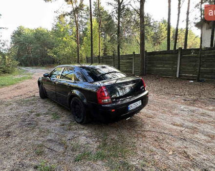 Черный Крайслер 300C, объемом двигателя 2.7 л и пробегом 165 тыс. км за 6699 $, фото 33 на Automoto.ua