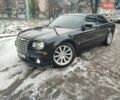 Черный Крайслер 300C, объемом двигателя 2.74 л и пробегом 220 тыс. км за 10500 $, фото 1 на Automoto.ua