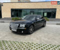 Черный Крайслер 300C, объемом двигателя 2.7 л и пробегом 265 тыс. км за 8200 $, фото 1 на Automoto.ua