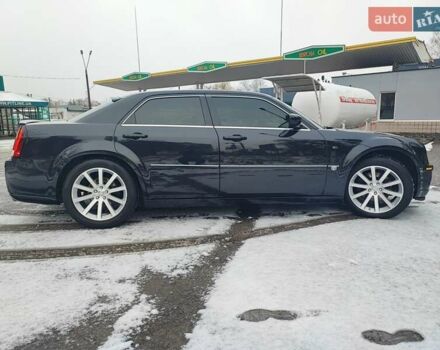 Черный Крайслер 300C, объемом двигателя 2.74 л и пробегом 220 тыс. км за 10500 $, фото 6 на Automoto.ua