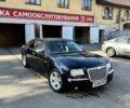 Черный Крайслер 300C, объемом двигателя 3 л и пробегом 390 тыс. км за 2811 $, фото 1 на Automoto.ua