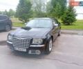 Черный Крайслер 300C, объемом двигателя 3 л и пробегом 214 тыс. км за 9500 $, фото 1 на Automoto.ua