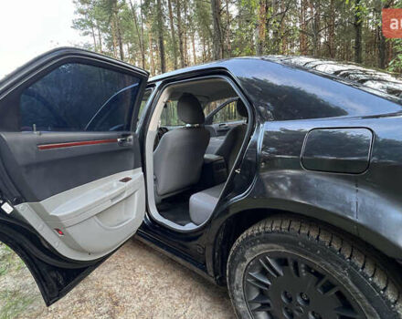 Черный Крайслер 300C, объемом двигателя 2.7 л и пробегом 165 тыс. км за 6699 $, фото 21 на Automoto.ua