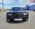 Черный Крайслер 300C, объемом двигателя 6.06 л и пробегом 210 тыс. км за 14900 $, фото 1 на Automoto.ua