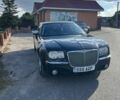 Черный Крайслер 300C, объемом двигателя 3 л и пробегом 140 тыс. км за 3513 $, фото 1 на Automoto.ua