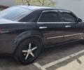 Черный Крайслер 300C, объемом двигателя 2.7 л и пробегом 128 тыс. км за 9200 $, фото 1 на Automoto.ua
