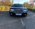 Черный Крайслер 300C, объемом двигателя 2.7 л и пробегом 250 тыс. км за 6500 $, фото 1 на Automoto.ua