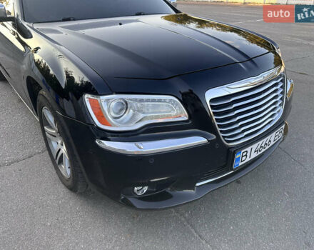 Черный Крайслер 300C, объемом двигателя 3.6 л и пробегом 220 тыс. км за 12900 $, фото 2 на Automoto.ua