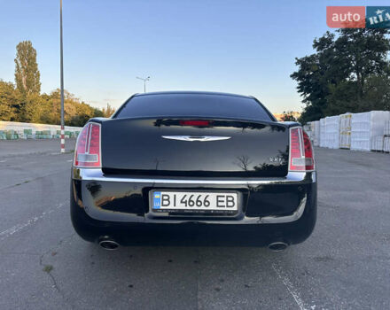 Черный Крайслер 300C, объемом двигателя 3.6 л и пробегом 220 тыс. км за 12900 $, фото 5 на Automoto.ua