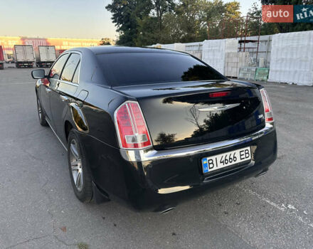 Черный Крайслер 300C, объемом двигателя 3.6 л и пробегом 220 тыс. км за 12900 $, фото 3 на Automoto.ua