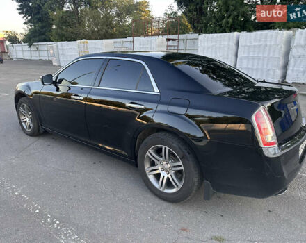 Черный Крайслер 300C, объемом двигателя 3.6 л и пробегом 220 тыс. км за 12900 $, фото 1 на Automoto.ua