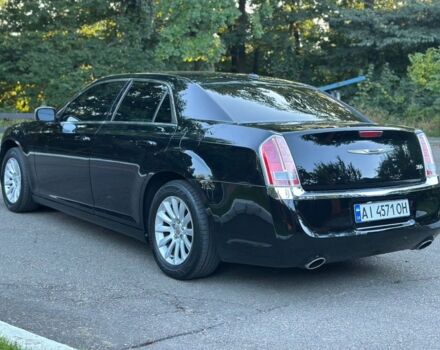 Крайслер 300C 2012 у Києві на Automoto.ua Чорний Крайслер 300C, об'ємом двигуна 3.6 л та пробігом 215 тис. км за 10900 $, фото 4 на Automoto.ua