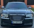 Крайслер 300C 2012 у Києві на Automoto.ua Чорний Крайслер 300C, об'ємом двигуна 3.6 л та пробігом 215 тис. км за 10900 $, фото 2 на Automoto.ua