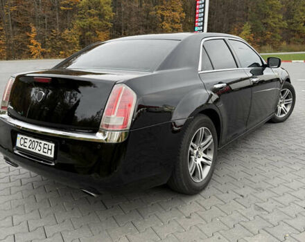 Черный Крайслер 300C, объемом двигателя 3 л и пробегом 280 тыс. км за 13000 $, фото 1 на Automoto.ua