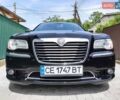 Черный Крайслер 300C, объемом двигателя 3 л и пробегом 259 тыс. км за 13000 $, фото 3 на Automoto.ua