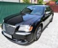 Черный Крайслер 300C, объемом двигателя 3 л и пробегом 259 тыс. км за 13000 $, фото 1 на Automoto.ua