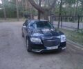 Черный Крайслер 300C, объемом двигателя 3.6 л и пробегом 155 тыс. км за 13000 $, фото 1 на Automoto.ua