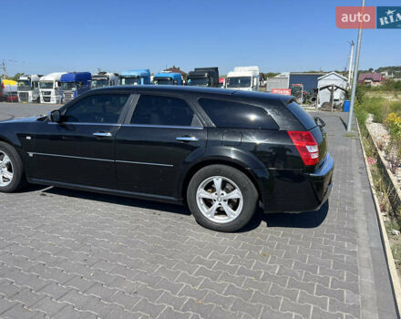 Черный Крайслер 300C, объемом двигателя 3 л и пробегом 300 тыс. км за 7999 $, фото 4 на Automoto.ua