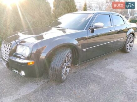 Черный Крайслер 300C, объемом двигателя 3.5 л и пробегом 202 тыс. км за 7593 $, фото 1 на Automoto.ua