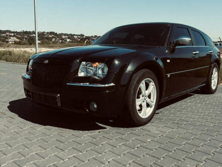 Черный Крайслер 300C, объемом двигателя 3 л и пробегом 300 тыс. км за 7599 $, фото 1 на Automoto.ua
