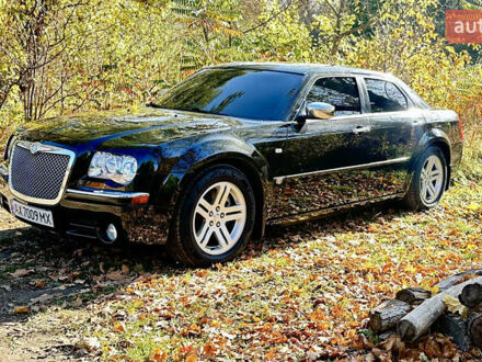 Черный Крайслер 300C, объемом двигателя 3.5 л и пробегом 270 тыс. км за 9500 $, фото 1 на Automoto.ua