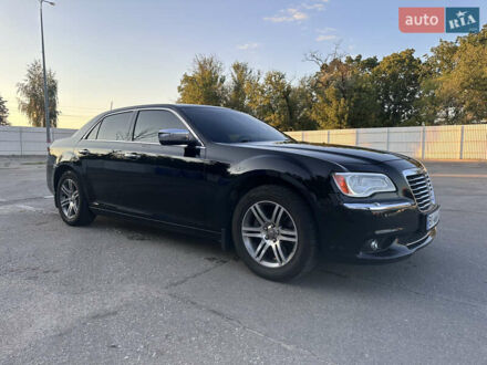Крайслер 300C 2011 в Кременчуге на Automoto.ua Черный Крайслер 300C, объемом двигателя 3.6 л и пробегом 220 тыс. км за 12900 $, фото 1 на Automoto.ua