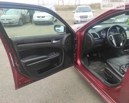 Червоний Крайслер 300C, об'ємом двигуна 3.6 л та пробігом 277 тис. км за 10350 $, фото 13 на Automoto.ua