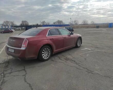 Червоний Крайслер 300C, об'ємом двигуна 3.6 л та пробігом 277 тис. км за 10350 $, фото 20 на Automoto.ua