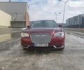 Красный Крайслер 300C, объемом двигателя 3.6 л и пробегом 145 тыс. км за 16700 $, фото 1 на Automoto.ua