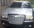 Серый Крайслер 300C, объемом двигателя 3.5 л и пробегом 300 тыс. км за 3496 $, фото 1 на Automoto.ua