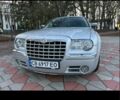Серый Крайслер 300C, объемом двигателя 3.5 л и пробегом 300 тыс. км за 8588 $, фото 1 на Automoto.ua