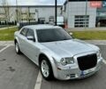 Серый Крайслер 300C, объемом двигателя 3 л и пробегом 404 тыс. км за 9899 $, фото 1 на Automoto.ua