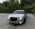 Серый Крайслер 300C, объемом двигателя 3 л и пробегом 399 тыс. км за 9500 $, фото 1 на Automoto.ua