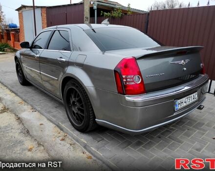 Серый Крайслер 300C, объемом двигателя 2.7 л и пробегом 241 тыс. км за 6800 $, фото 5 на Automoto.ua