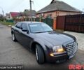 Серый Крайслер 300C, объемом двигателя 2.7 л и пробегом 210 тыс. км за 10000 $, фото 1 на Automoto.ua