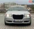 Серый Крайслер 300C, объемом двигателя 5.65 л и пробегом 161 тыс. км за 14800 $, фото 1 на Automoto.ua