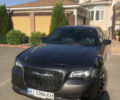 Серый Крайслер 300C, объемом двигателя 3.6 л и пробегом 150 тыс. км за 14200 $, фото 1 на Automoto.ua