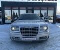 Серый Крайслер 300C, объемом двигателя 5.65 л и пробегом 328 тыс. км за 8999 $, фото 1 на Automoto.ua