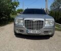 Серый Крайслер 300C, объемом двигателя 3.52 л и пробегом 279 тыс. км за 5500 $, фото 1 на Automoto.ua