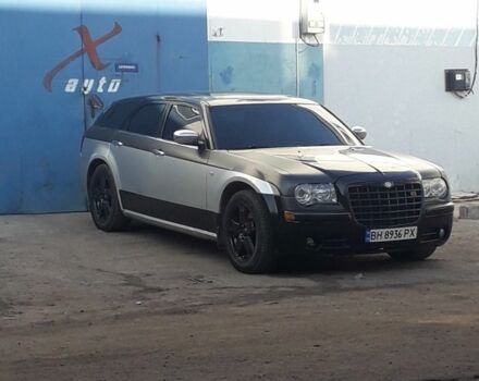 Серый Крайслер 300C, объемом двигателя 5.7 л и пробегом 350 тыс. км за 8938 $, фото 1 на Automoto.ua