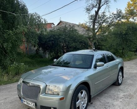 Серый Крайслер 300C, объемом двигателя 3.5 л и пробегом 229 тыс. км за 7700 $, фото 1 на Automoto.ua