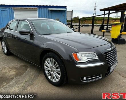 Серый Крайслер 300C, объемом двигателя 3.6 л и пробегом 165 тыс. км за 11600 $, фото 1 на Automoto.ua