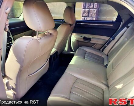 Синий Крайслер 300C, объемом двигателя 2.7 л и пробегом 200 тыс. км за 7300 $, фото 5 на Automoto.ua
