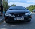 Черный Крайслер 300М, объемом двигателя 2.7 л и пробегом 200 тыс. км за 2731 $, фото 4 на Automoto.ua