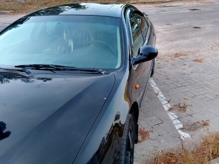 Черный Крайслер 300М, объемом двигателя 2.7 л и пробегом 408 тыс. км за 3500 $, фото 1 на Automoto.ua